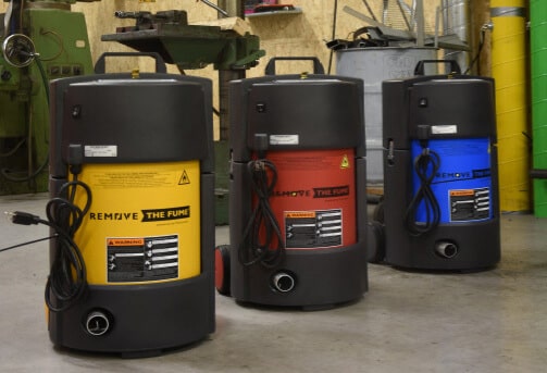 Portable high vacuum fume extractor in yellow, red and blue