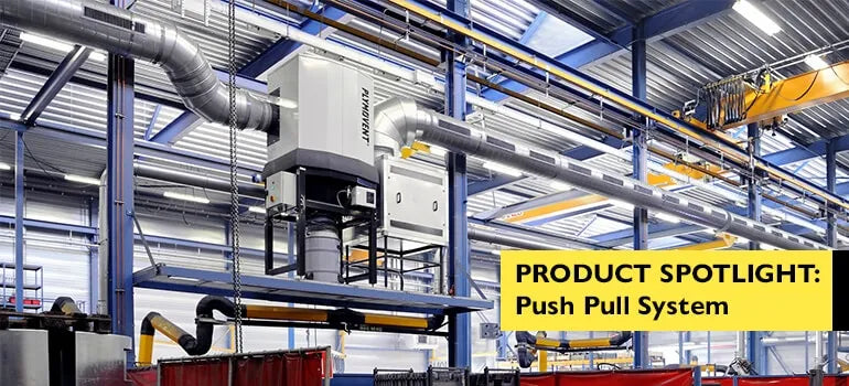 The image shows a grey colored push pull system by Plymovent in a facility. The text on the image shows "Product Spotlight: Push Pull System"