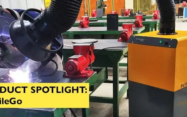 A man welding with a protective mask on a while yellow Remove The Fume fume extractor arm is inhaling all the harmful fume away with text over the image saying "Product Spotlight: MobileGo".
