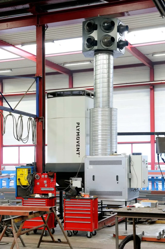 Silver colored push-pull system by Plymovent inside a facility