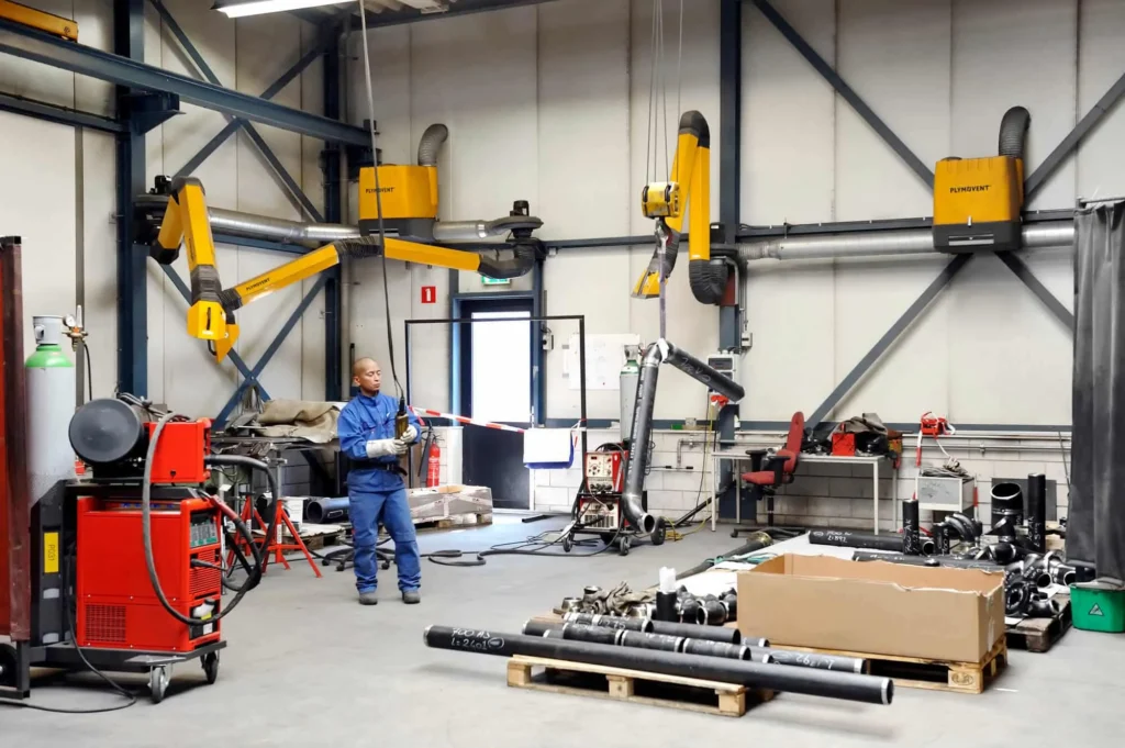 image of a workshop with multiple Plymovent welding industrial fume extraction